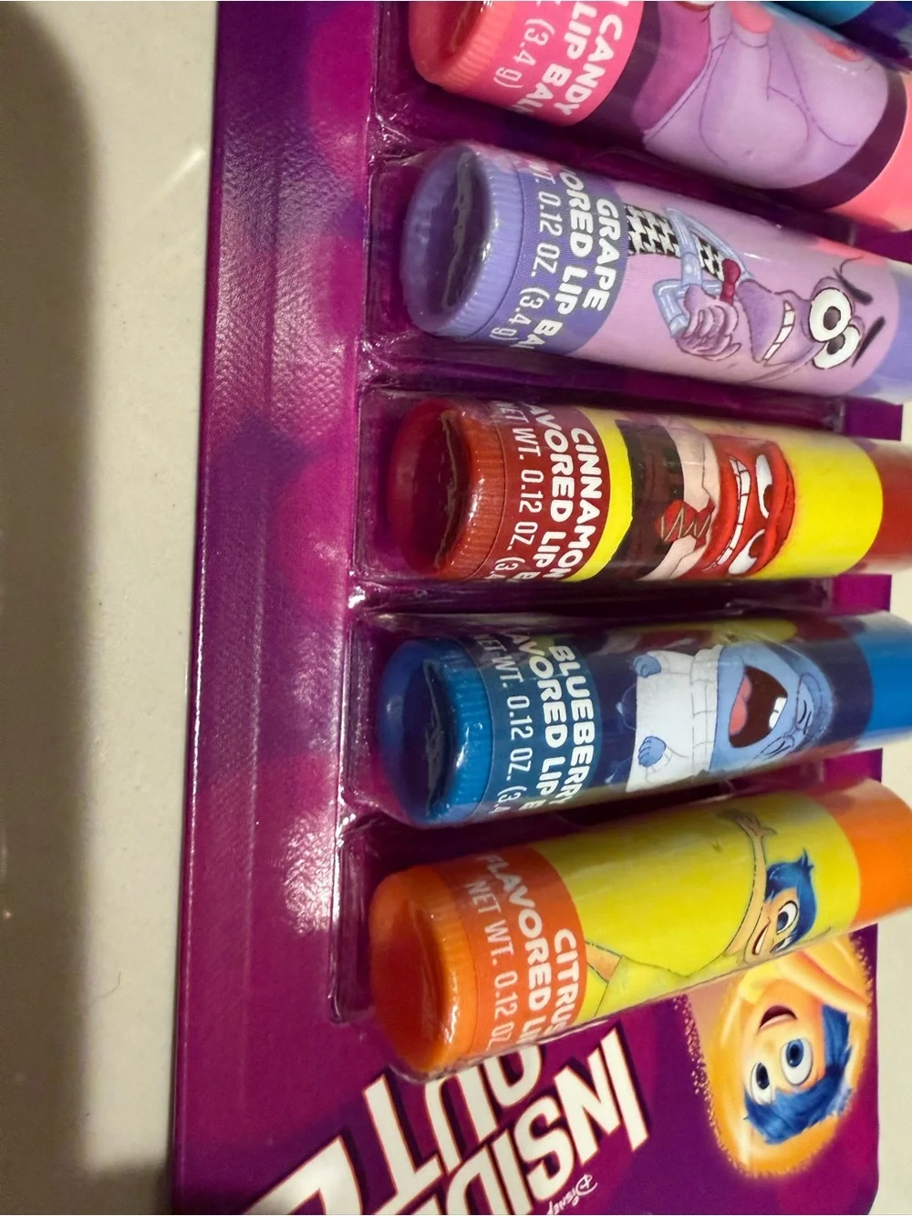 Disney pixar inside out 2 - 8 flavored lip balms apple berry cotton candy grape